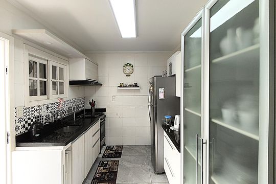 Cozinha de casa de condomínio à venda com 3 quartos, 162m² em Guarujá, Porto Alegre