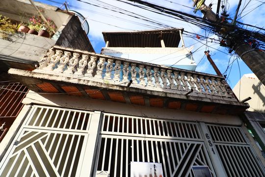 Fachada de casa à venda com 5 quartos, 260m² em Conceicao, Osasco