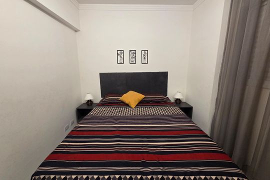 Suíte 1 de apartamento para alugar com 2 quartos, 78m² em Jardim Samoa, Praia Grande