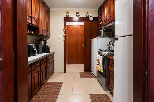 Cozinha de apartamento à venda com 2 quartos, 58m² em Humaitá, Porto Alegre
