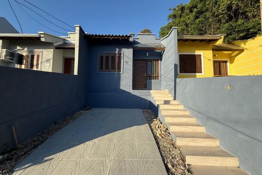 Fachada de casa para alugar com 2 quartos, 55m² em Loteamento Jardim Timbaúva, Gravataí