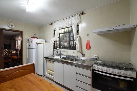 Cozinha de casa à venda com 4 quartos, 220m² em Mossunguê, Curitiba