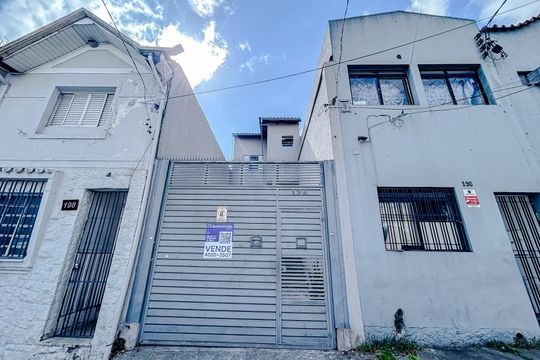 Fachada com Plaquinha de casa à venda com 2 quartos, 85m² em Penha de França, São Paulo