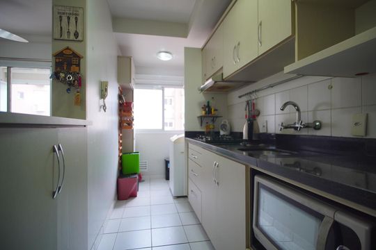 Cozinha de apartamento à venda com 2 quartos, 64m² em Sarandi, Porto Alegre
