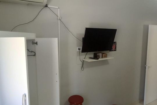 Sala de apartamento para alugar com 2 quartos, 56m² em Vila Alzira, Guarujá