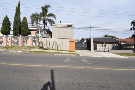 Fachada de casa de condomínio para alugar com 3 quartos, 180m² em Bacacheri, Curitiba