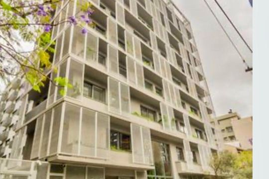 Fachada de kitnet/studio para alugar com 1 quarto, 46m² em Auxiliadora, Porto Alegre