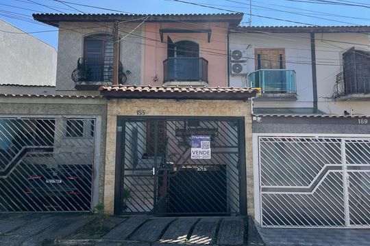 Fachada+Placa  de casa à venda com 2 quartos, 90m² em Cidade Líder, São Paulo
