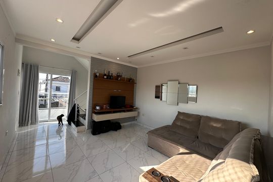Sala de casa de condomínio para alugar com 3 quartos, 145m² em Vila Voturuá, São Vicente