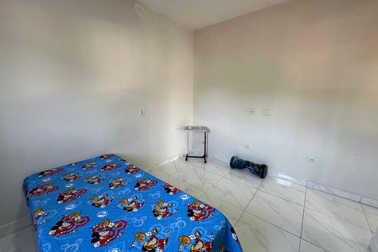 Suíte 2 de casa de condomínio para alugar com 3 quartos, 145m² em Vila Voturuá, São Vicente