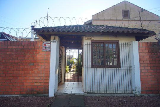 FACHADA de casa de condomínio à venda com 2 quartos, 44m² em Vicentina, São Leopoldo