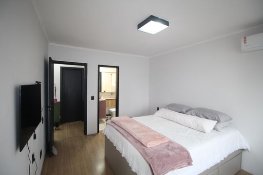 Suíte 1 de apartamento à venda com 4 quartos, 90m² em Auxiliadora, Porto Alegre
