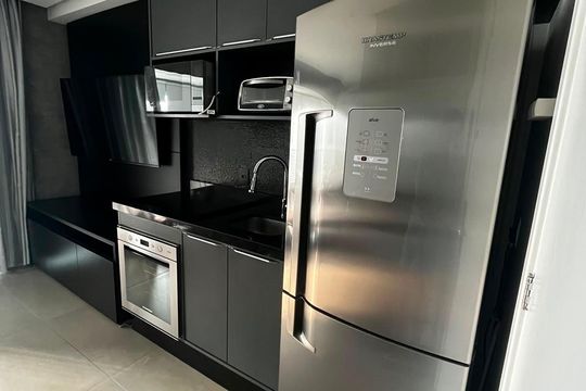 Cozinha de apartamento para alugar com 1 quarto, 33m² em Brooklin, São Paulo