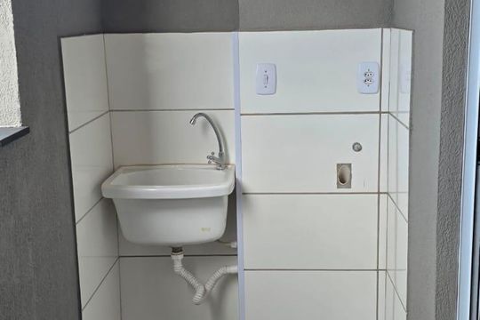 Área de serviço de apartamento para alugar com 2 quartos, 52m² em Laranjeiras, Uberlândia
