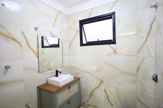Banheiro 4 de casa à venda com 3 quartos, 150m² em Parque Continental, São Paulo