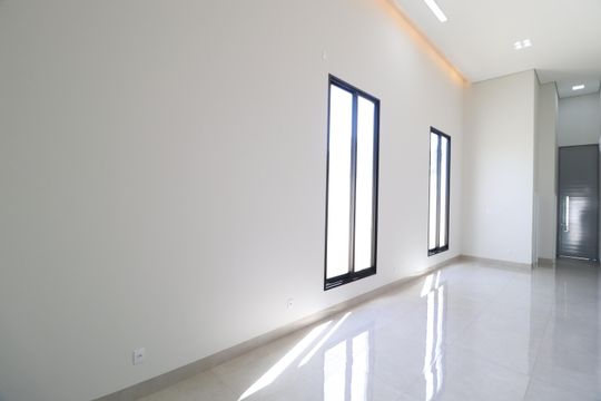 Sala de casa de condomínio para alugar com 3 quartos, 210m² em Laranjeiras, Uberlândia