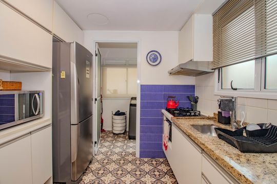 Cozinha e Área de Serviço de casa de condomínio à venda com 4 quartos, 156m² em Sarandi, Porto Alegre