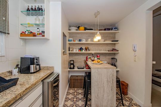 Cozinha e Área de Serviço de casa de condomínio à venda com 4 quartos, 156m² em Sarandi, Porto Alegre