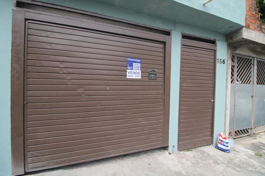 Fachada  de casa à venda com 6 quartos, 125m² em Vila Natal, São Paulo