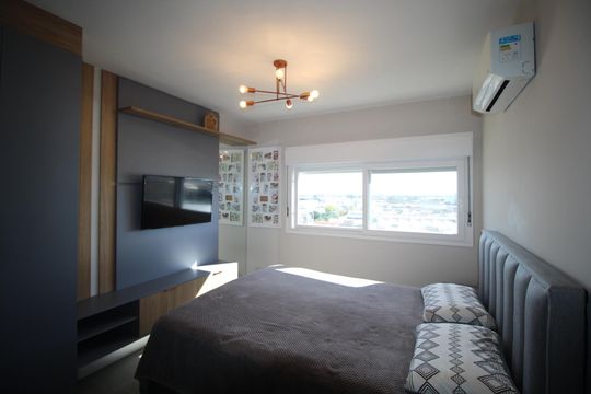Suíte 1 de apartamento para alugar com 2 quartos, 62m² em Navegantes, Porto Alegre