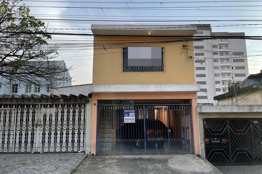 Fachada+Placa de casa à venda com 4 quartos, 214m² em Conjunto Residencial José Bonifácio, São Paulo