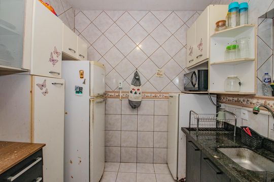 Cozinha de apartamento à venda com 4 quartos, 100m² em Petrópolis, Porto Alegre