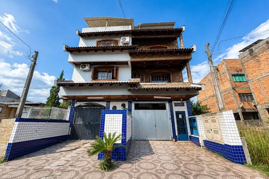 Fachada de casa para alugar com 3 quartos, 330m² em Vila Jardim America, Cachoeirinha