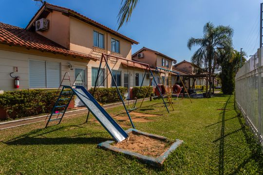 Área comum - Playground de casa de condomínio à venda com 2 quartos, 65m² em Parque Santa Fé, Porto Alegre