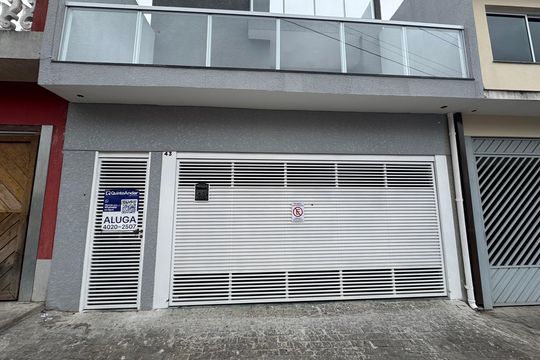 Fachada com placa grande  de casa para alugar com 3 quartos, 120m² em Jardim D’abril, Osasco