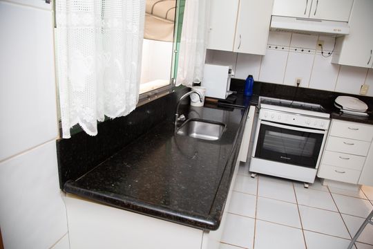 Cozinha de casa de condomínio à venda com 4 quartos, 202m² em Alphaville Araguaia, Goiânia