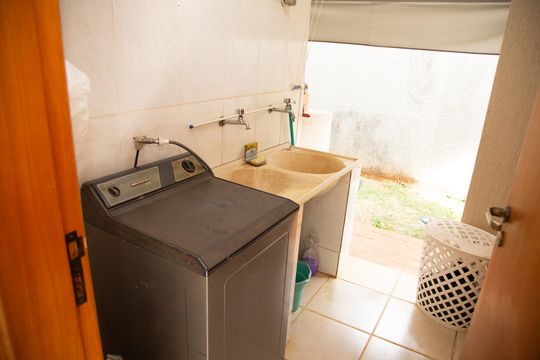 Área de serviço de casa de condomínio à venda com 4 quartos, 202m² em Alphaville Araguaia, Goiânia