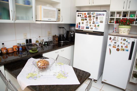 Cozinha de casa de condomínio à venda com 4 quartos, 202m² em Alphaville Araguaia, Goiânia