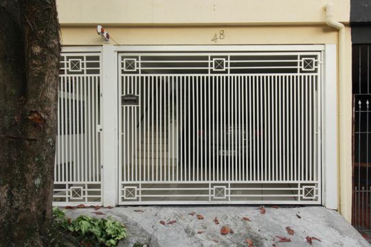 Fachada de casa à venda com 3 quartos, 148m² em Parque Sao Domingos, São Paulo