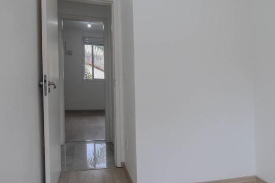 Quarto 2 de casa de condomínio à venda com 3 quartos, 107m² em Partenon, Porto Alegre