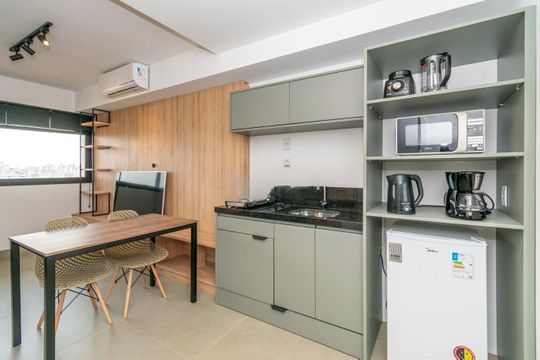 Cozinha de apartamento à venda com 1 quarto, 24m² em Rio Branco, Porto Alegre