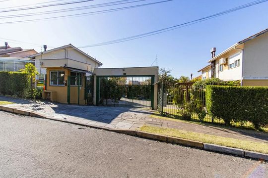Fachada de casa de condomínio para alugar com 3 quartos, 250m² em Mário Quintana, Porto Alegre