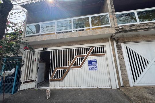 Fachada com placa grande  de casa à venda com 2 quartos, 203m² em Conj Res Morro Farol, Osasco