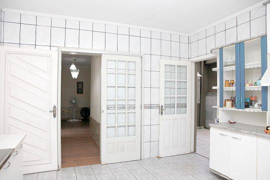 Cozinha de casa à venda com 3 quartos, 188m² em Auxiliadora, Porto Alegre