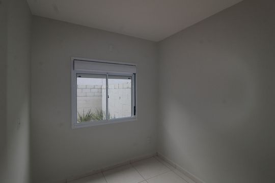Quarto de casa de condomínio à venda com 2 quartos, 42m² em Restinga, Porto Alegre