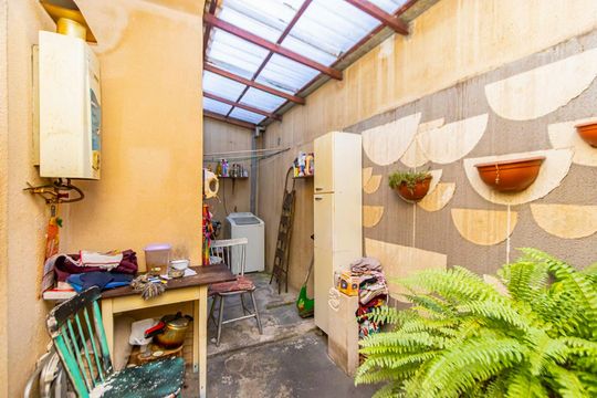 Área externa de casa à venda com 3 quartos, 146m² em Uberaba, Curitiba