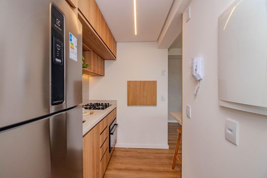 Cozinha e Área de Serviço de apartamento à venda com 2 quartos, 64m² em Petrópolis, Porto Alegre