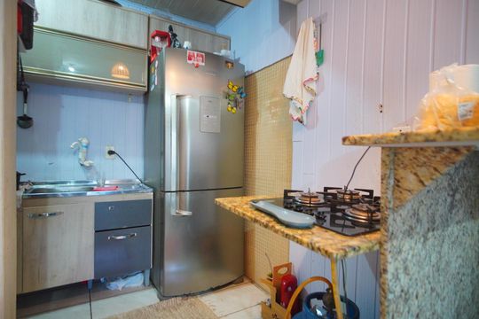 Cozinha de casa de condomínio para alugar com 2 quartos, 70m² em Sarandi, Porto Alegre