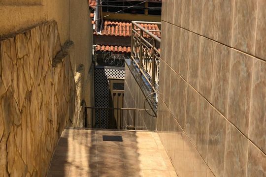 Área externa de casa para alugar com 4 quartos, 300m² em Santa Cruz, Belo Horizonte