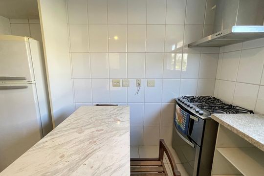 Cozinha de casa de condomínio à venda com 2 quartos, 107m² em Umuarama, São Paulo
