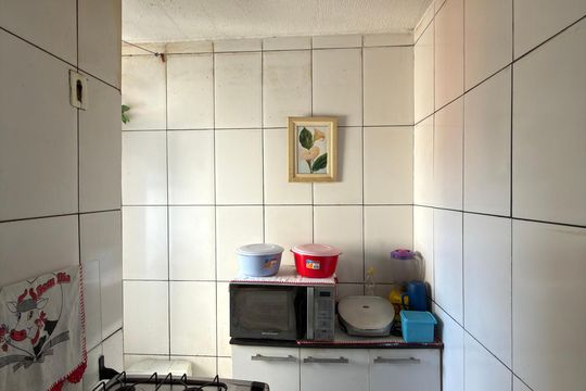 Cozinha e Área de Serviço de apartamento à venda com 2 quartos, 42m² em Cooperativa, São Bernardo do Campo