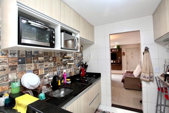 Cozinha e Área de Serviço de apartamento à venda com 2 quartos, 50m² em Camargos, Belo Horizonte