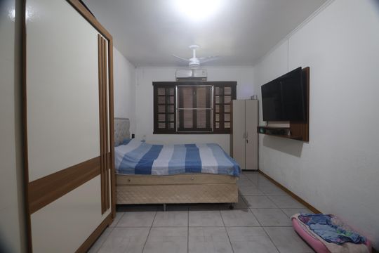 Suíte de casa à venda com 3 quartos, 350m² em Rio Branco, Canoas
