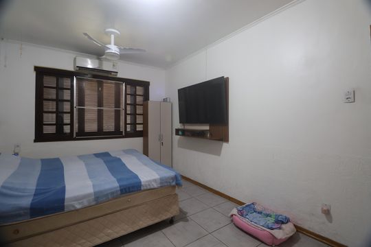 Suíte de casa à venda com 3 quartos, 350m² em Rio Branco, Canoas