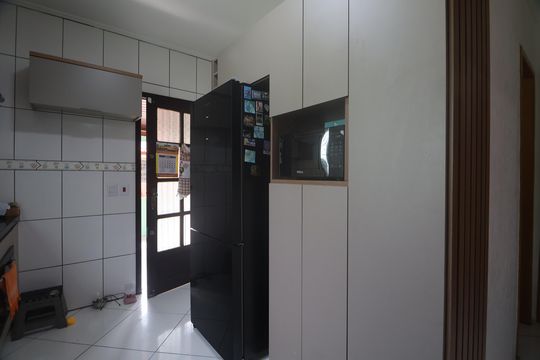 Cozinha  de casa à venda com 3 quartos, 350m² em Rio Branco, Canoas