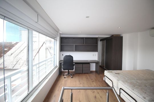 Suíte 1 de apartamento para alugar com 1 quarto, 93m² em Auxiliadora, Porto Alegre